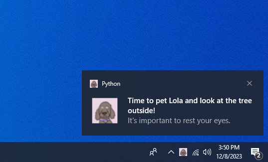 Screenshot of notification on Windows computer that says "Time to pet Lola and look at the tree outside! It's important to rest your eyes.